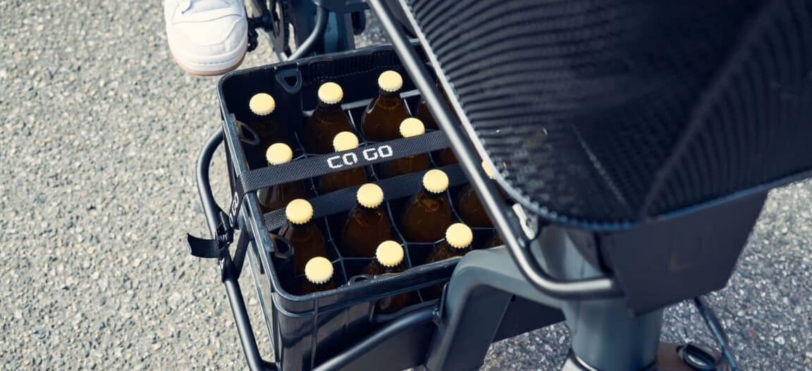 vélo électrique triporteur cargaison bouteilles verre