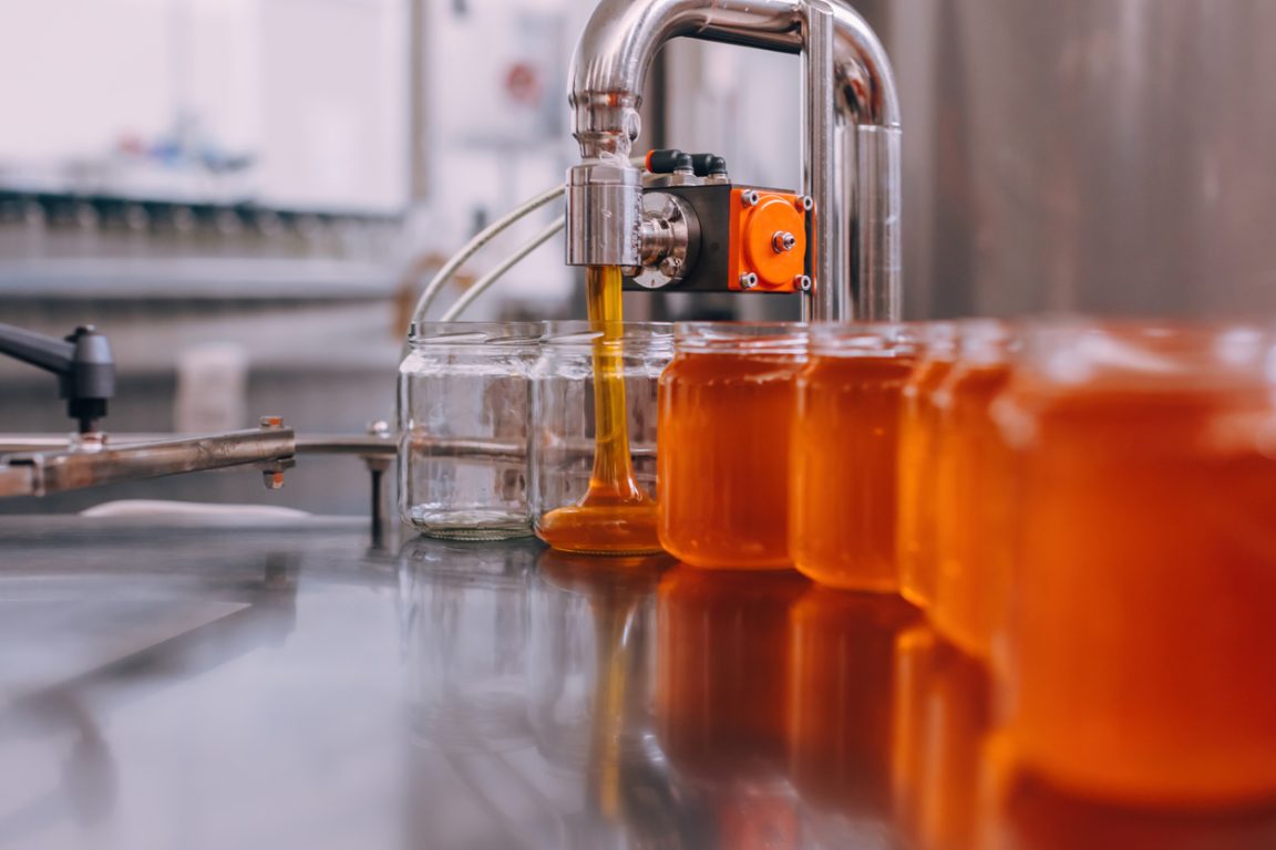 ligne de production de miel pots usine industriel faux