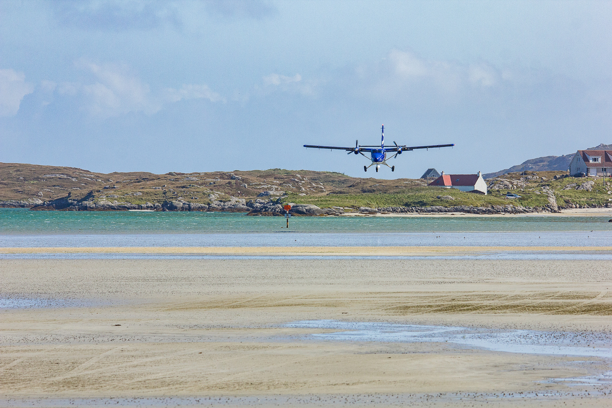 avion atterrir plage mer île Barra Ecosse